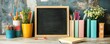 © Настя Шевчук - Creative desk setup with chalkboard, colorful pencils, and books