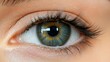 © Amigo - Close-up view of a human eye showcasing intricate details and vibrant colors in natural light