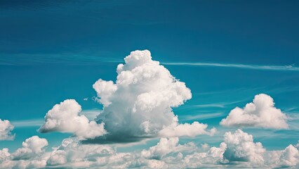 Sticker - Fluffy white cumulus clouds scattered across a vibrant blue sky creating a calm and peaceful atmosphere on a sunny day.