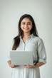 © Rawpixel.com - A indain woman wearing a shirt laptop portrait smile.