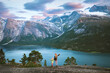 © EVERST - Family traveling in Norway mother and child hiking travel adventure healthy lifestyle vacations eco tourism outdoor, mom and kid enjoying sunset mountains and fjord views