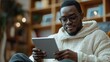 © ANEK - African freelancer chatting with customer who purchase from his shopping online internet platform.