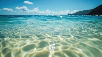 Poster - A serene close-up of clear ocean water reflecting sunlight with ample space for overlay text or branding elements.