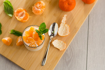 Wall Mural - Creamy yogurt with tangerine slices