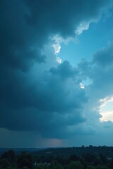 Wall Mural - blue haze with dark clouds moving across the sky, darkening sky, dark clouds, cloudy landscape