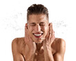 © New Africa - Smiling man washing his face on white background