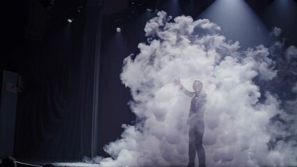 Leinwandbilder - Magical performance with mesmerizing light effects on stage at night