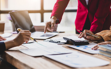 Wall Mural - Business team meeting and financial advisor reviewing accounts and analyzing financial reports. Financial planning and business budgets. Auditor team working in office.