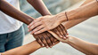 © Afaq - Teamwork and Unity Concept: Hands Stacked in Collaboration and Support