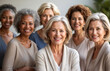© starblue - group of smiling confident multi ethnic happy women in menopause age, multiracial friendship of women of mature age