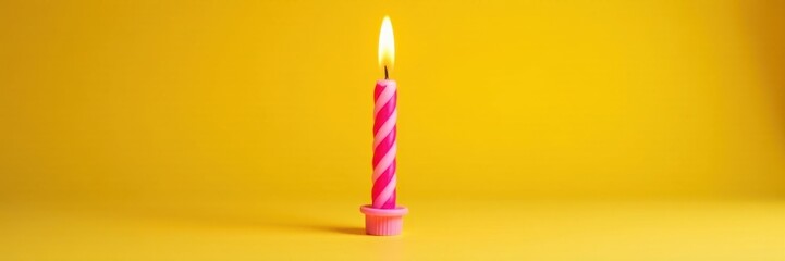 pink striped birthday candle in flames on a bright yellow surface, flame, spark, blazing