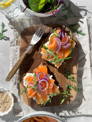 Wall Mural - Sandwiches with salted salmon and cream cheese, top view