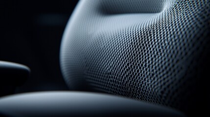 Close-up of Mesh Chair Backrest: Ergonomic Design Texture