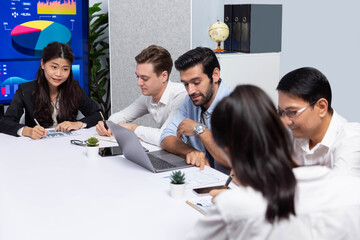 Fototapete - Analyst team utilizing BI Fintech to analyze financial data at table in meeting room. Businesspeople analyzing BI dashboard power for business insight and strategic marketing planning. Prudent