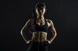 © mehaniq41 - Fit asian female athlete posing in dark gym. Neural network AI generated