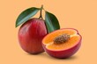 © darshika - A whole and a halved red peach with green leaves on a peach background.