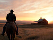 © Bohdan - Cowboy riding into sunset near rustic barn