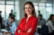© Pete - Confident young woman in modern office. Wears vibrant red blouse. Colleagues work in friendly atmosphere. Contemporary office design. Businesswoman in pro setting. Casual attire. Teamwork. Positive
