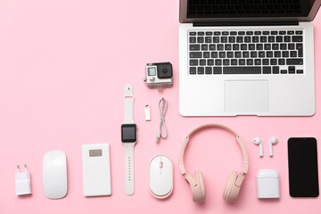 Wall Mural - set of modern devices on pink background, top view