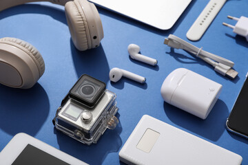 Wall Mural - composition with modern gadgets on blue background