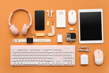 Wall Mural - composition with various modern devices on color background