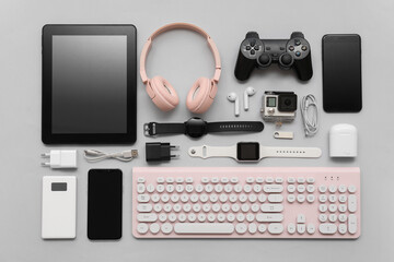 Wall Mural - composition with various modern devices on grey background