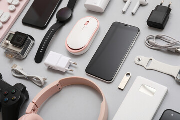 Wall Mural - composition with various modern gadgets on grey background