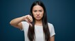 © Hung - beautiful woman doing the thumbs down gesture