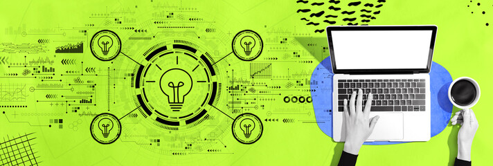 Wall Mural - idea light bulb theme with person using a laptop computer