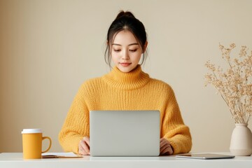 Aufkleber - Minimalist Home Workspace Asian Woman in Cozy Knit Engaging in Remote Learning with Laptop and Coffee - EdTech and Modern Workspace Solutions for Millennials
