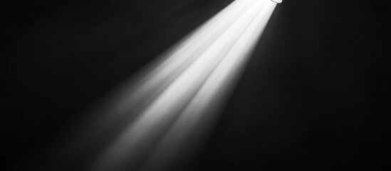 Poster - Bright light beam on dark background.