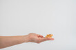 © apinya - Sweet Bakery Cookies with Red Jam and hand on white background