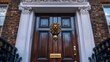 © heinng - Majestic lion door knocker adorns rich dark wood door elegant building. AI Generated