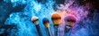 © yanadjan - Different makeup brushes on a shiny background. Selective focus.
