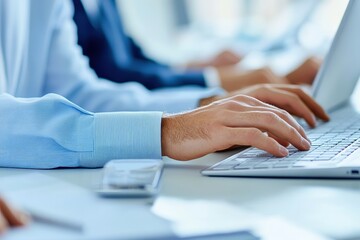 Wall Mural - close-up of two coworkers reviewing data on a desktop pc, with transparent icons representing teamwo