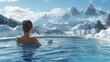 © BlueJay - Woman relaxing in infinity pool overlooking snowy mountain peaks