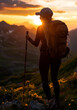 © Erzsbet - Silhouette of a Woman Hiking at Sunrise in the Mountains