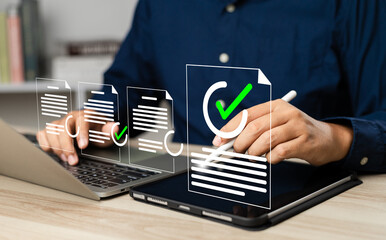 Canvas Print - Business performance monitoring and evaluation concept, Take an assessment, Business man using laptop and tablet online checklist survey, Filling out digital checklist, Questionnaire with checkboxes.