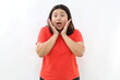 © ArvStd - Cheerful asian woman look with surprised face at camera, react to awesome good news, smiling and cheering, standing against white background