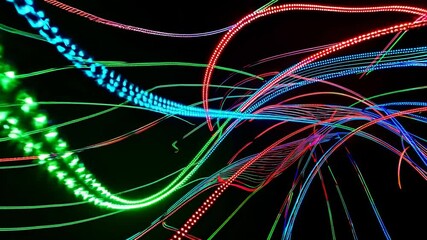 Leinwandbilder - Colorful light patterns create mesmerizing effects during a vibrant dance performance at an indoor venue