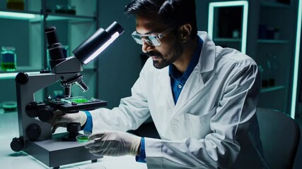 Leinwandbilder - Scientist conducts research using a microscope in a modern laboratory setting