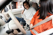 © Maria Vitkovska - Young Couple Fastening Seat Belts in Car