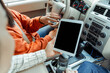 © Maria Vitkovska - Woman showing tablet with blank screen to driver in car