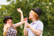 © Voyagerix - Couple blowing soap bubbles, having fun
