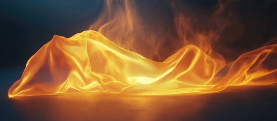 Canvas Print - Soft glowing orange artificial fabric flowing elegantly on a dark backdrop with empty negative space for text or design elements