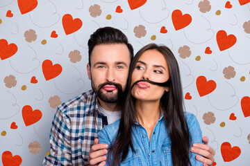 Poster - Comic, funky partners holding strand of hair with pout lips like mustache over grey background, fooling on valentine day