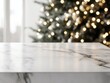 © Bijac - modern minimalist white marble table surface with soft-focus christmas tree backdrop, professional studio lighting, luxury product display setting