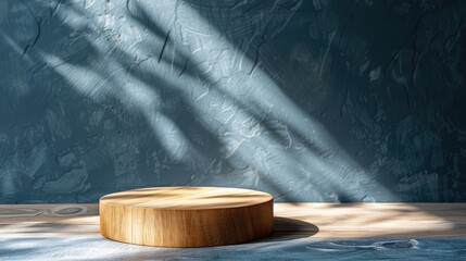 Poster - Wooden pedestal with empty space for decor, blue wall, shadows, dark indoor, morning sunlight.