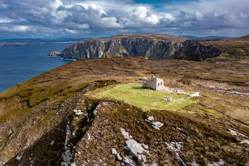 Poster - Aerial view of the cliffs of Horn Head and the look out tower at the wild atlantic way in Donegal - Ireland.