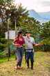 © Daniel Ching - Young Colombian couple embracing in a rural location, she is a young brunette woman and he is a young Latino man. Scene in the mountains of Riosucio, a town in the coffee region of Colombia.